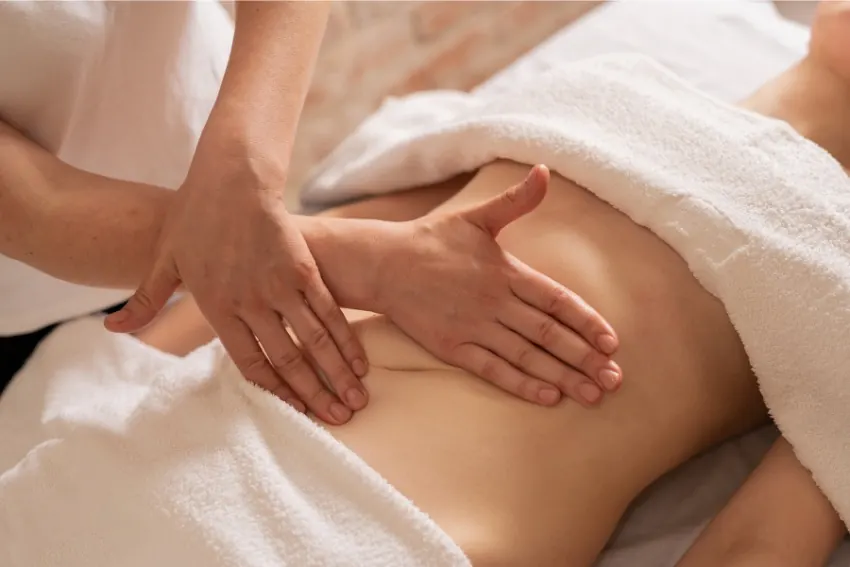 Lymphatic drainage massage on the abdomen